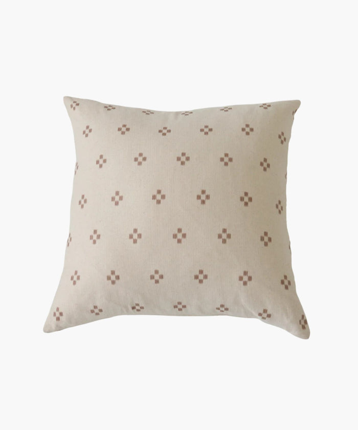 Square decorative pillow with a subtle geometric pattern on a beige background. | Wildwood Home Co.