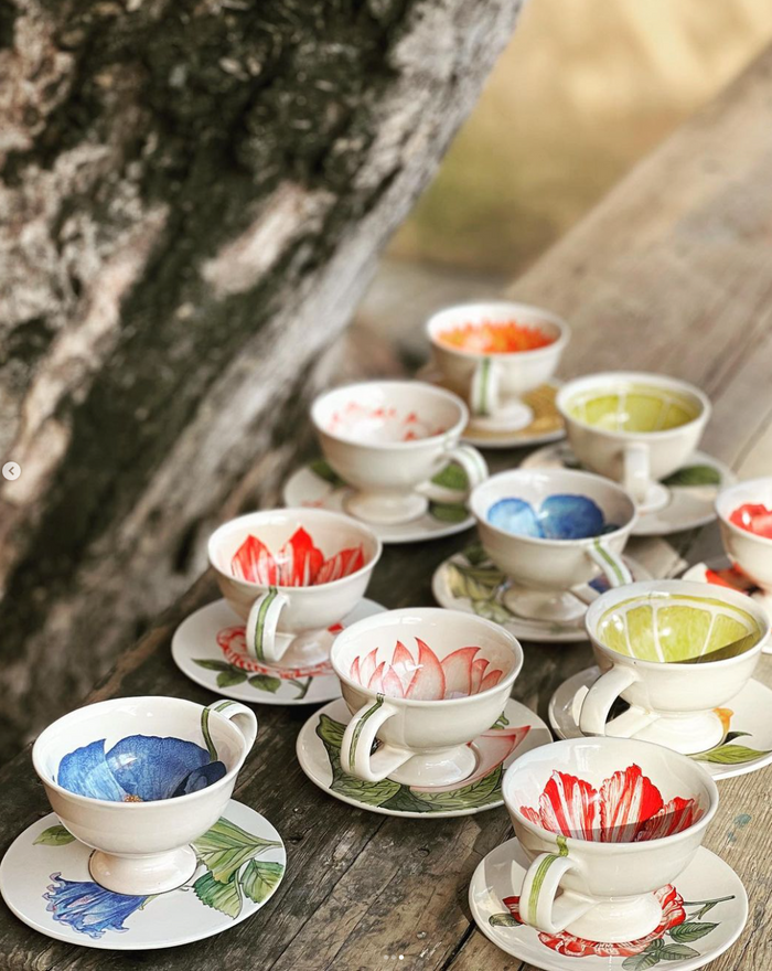 Hand painted botanical tea cup and saucer with an orange botanical illustration. Chic hostess gift.