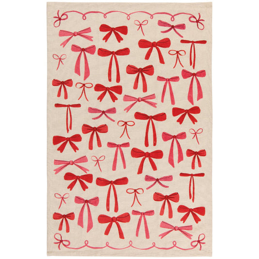 Beige towel with red bow pattern