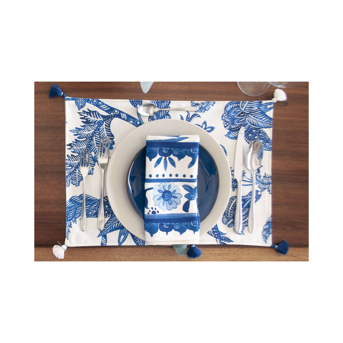 Coastal Chic Table Setting Costa blu placemats, set of 8, laid out on a dining table, showcasing a coastal inspired design