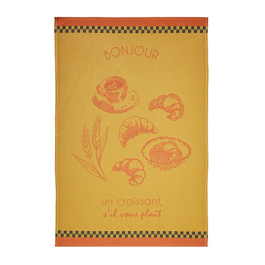 Yellow towel with French text and bread illustrations on a white background
