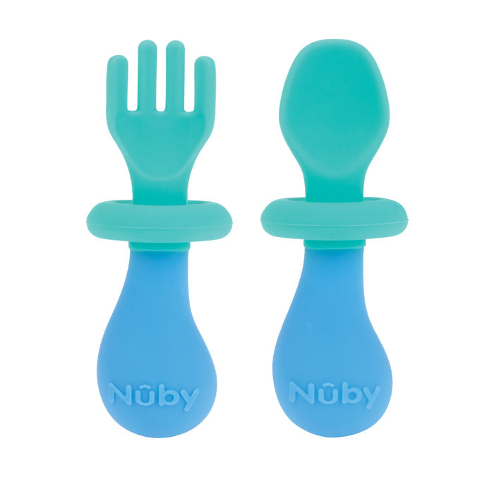 The First Fork & Spoon Set by Nûby includes two blue and teal silicone utensils with rounded, wide handles and safety guard disks—ideal for babies learning self-feeding and designed to help prevent choking.