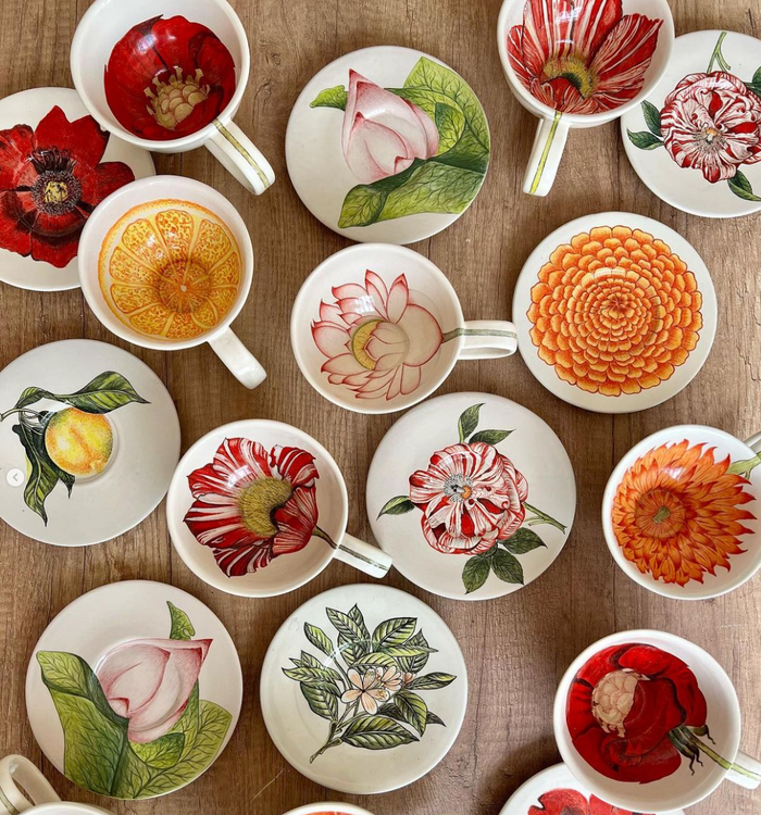 Hand painted botanical tea cup and saucer with an orange botanical illustration. Chic hostess gift.