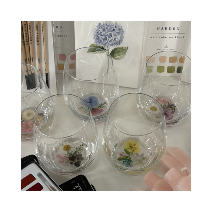 Crystal flower stemless wine glass made with real flowers in resin for an elegant sip. Perfect for spring summer soirees.