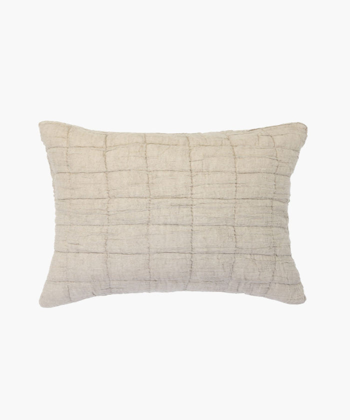 Rectangular beige cotton-linen sham with puckered gauzy texture and subtle block quilting.