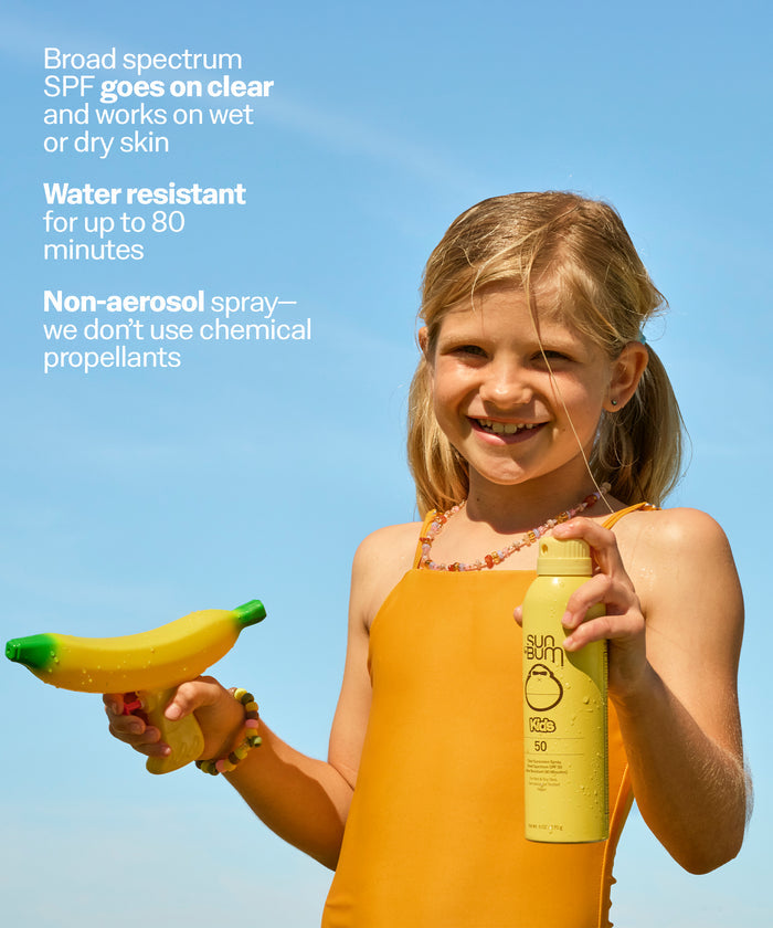 Child holding a banana and a Sun Bum sunscreen spray bottle against a clear blue sky. Broad spectrum
SPF goes on clear and works on wet or dry skin
Water resistant for up to 80 minutes
Non-aerosol spray-we don't use chemical propellants.