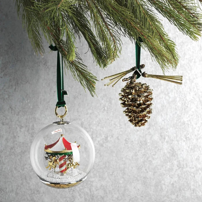 Michael Aram merry-go-round snow globe ornament, metal with festive design, for joyful decoration.