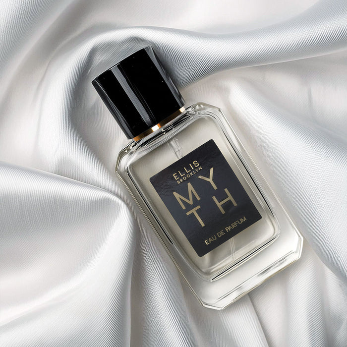 Myth 50ml Eau De Parfum on white satin sheet.