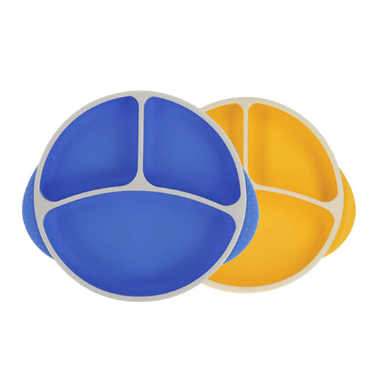 The Nuby Round Silicone Suction Plate & Lid (2 Pack) in blue and yellow features divided sections, white rims, and textured side grips—perfect for little ones learning to eat.