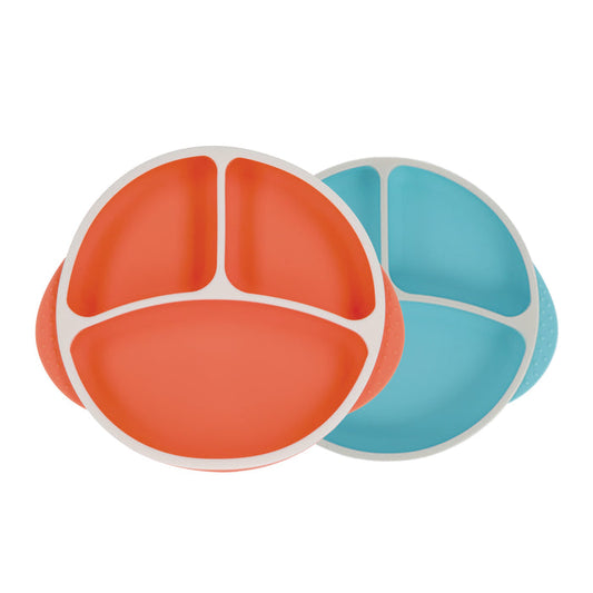 The Nuby Round Silicone Suction Plate & Lid (2 Pack) in orange and aqua features divided sections and secure suction for mess-free baby meals. Includes lids for easy storage.
