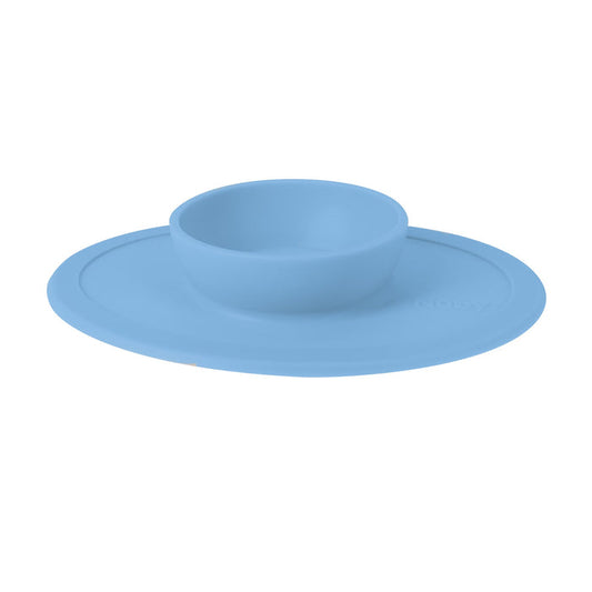 The Sure Grip Silicone Suction Bowl is a blue silicone bowl for babies or toddlers, featuring a wide base, central bowl, and strong suction to prevent spills and support easy self-feeding.