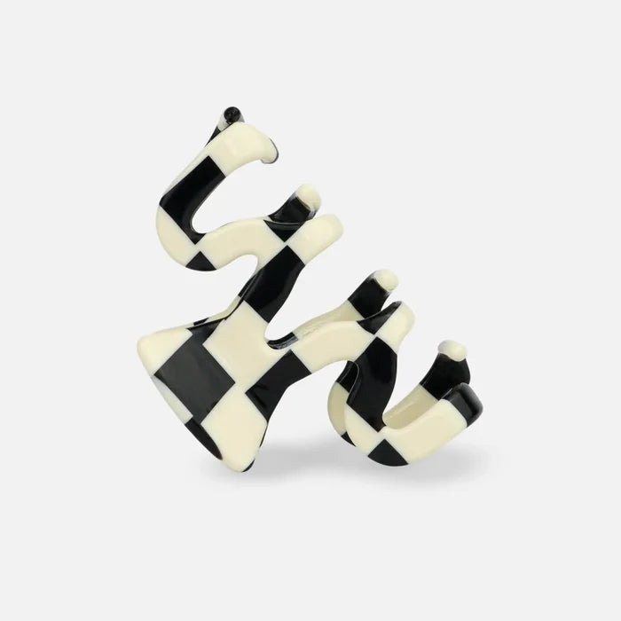 sasstie checked black and white hair clip on a white background