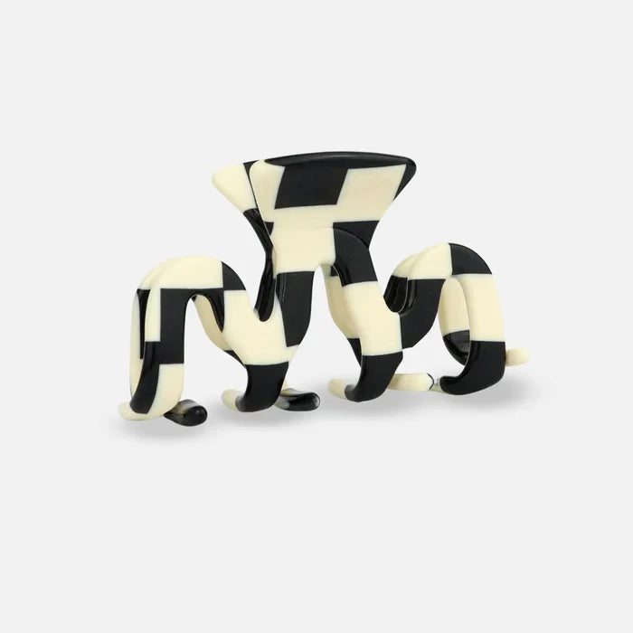 sasstie checked black and white hair clip on a white background